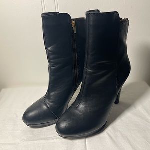 Black high heal gold accent boots